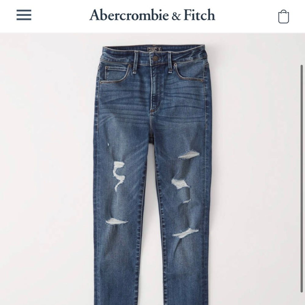 Ripped High Rise Super Skinny Ankle Jeans.